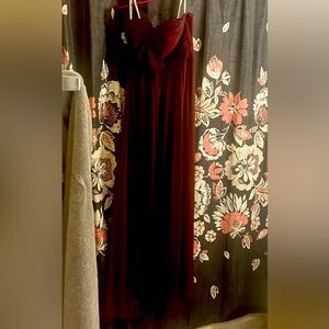 Burgundy strapless gown.